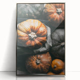 Mid-century modernist art depicting autumn trees in warm orange tones on a silver-framed acrylic print.
