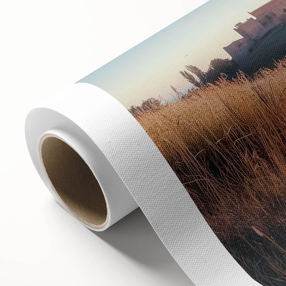 Rolled canvas showcasing a vibrant landscape with a majestic castle surrounded by lush greenery and a clear blue sky, designed for wall decor enthusiasts.
