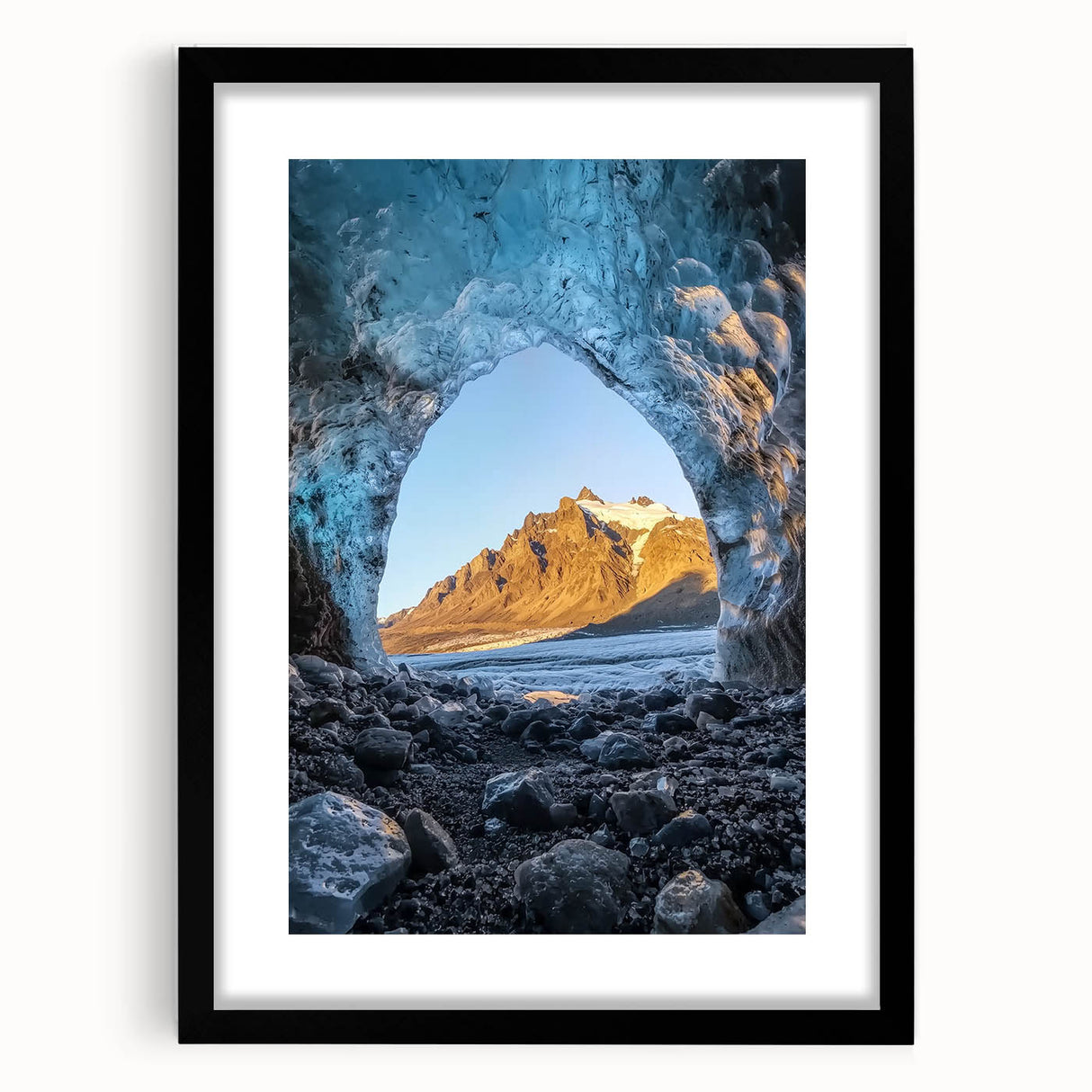 Framed black landscape artwork featuring a cave scene, elegantly matted, showcasing intricate details and textures, ideal for modern home decor.