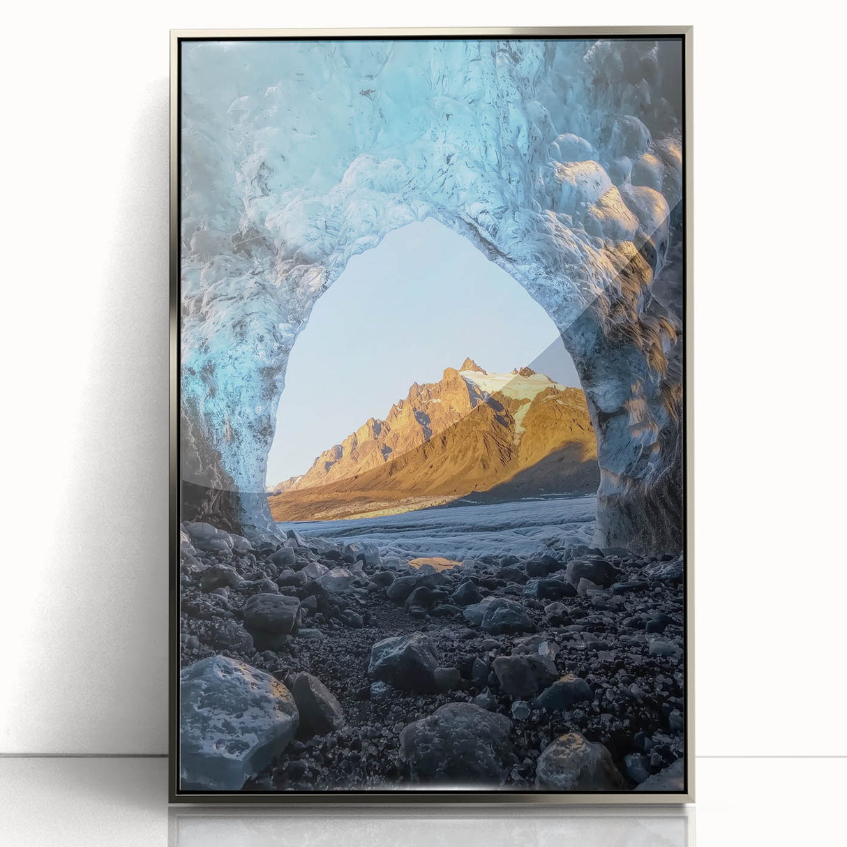 Framed acrylic artwork showcasing a stunning landscape scene with intricate cave details, featuring a sleek silver frame that enhances the visual appeal.