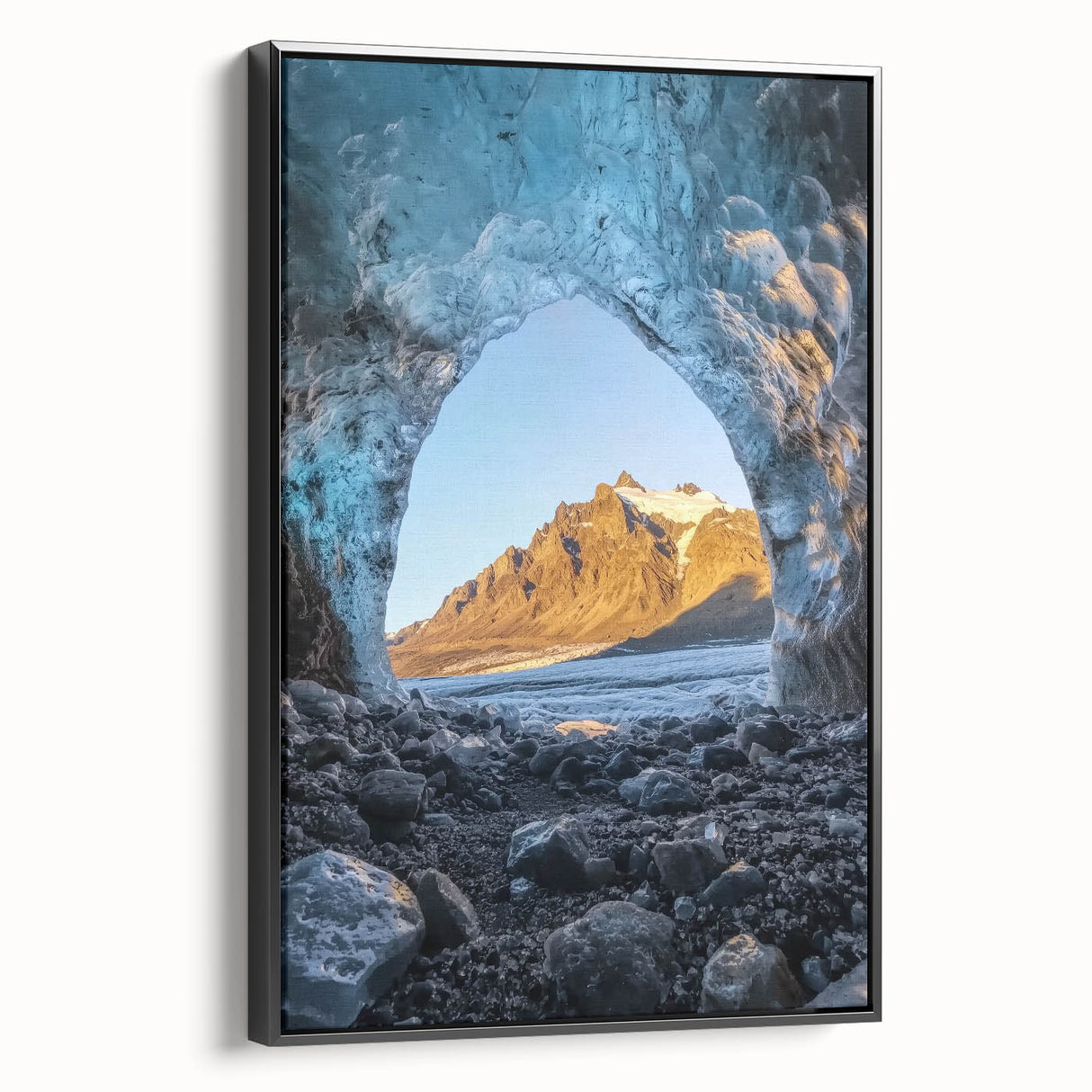 Framed canvas artwork depicting a serene landscape with caves and lush greenery, featuring a black side view for a modern aesthetic, perfect for home decor.