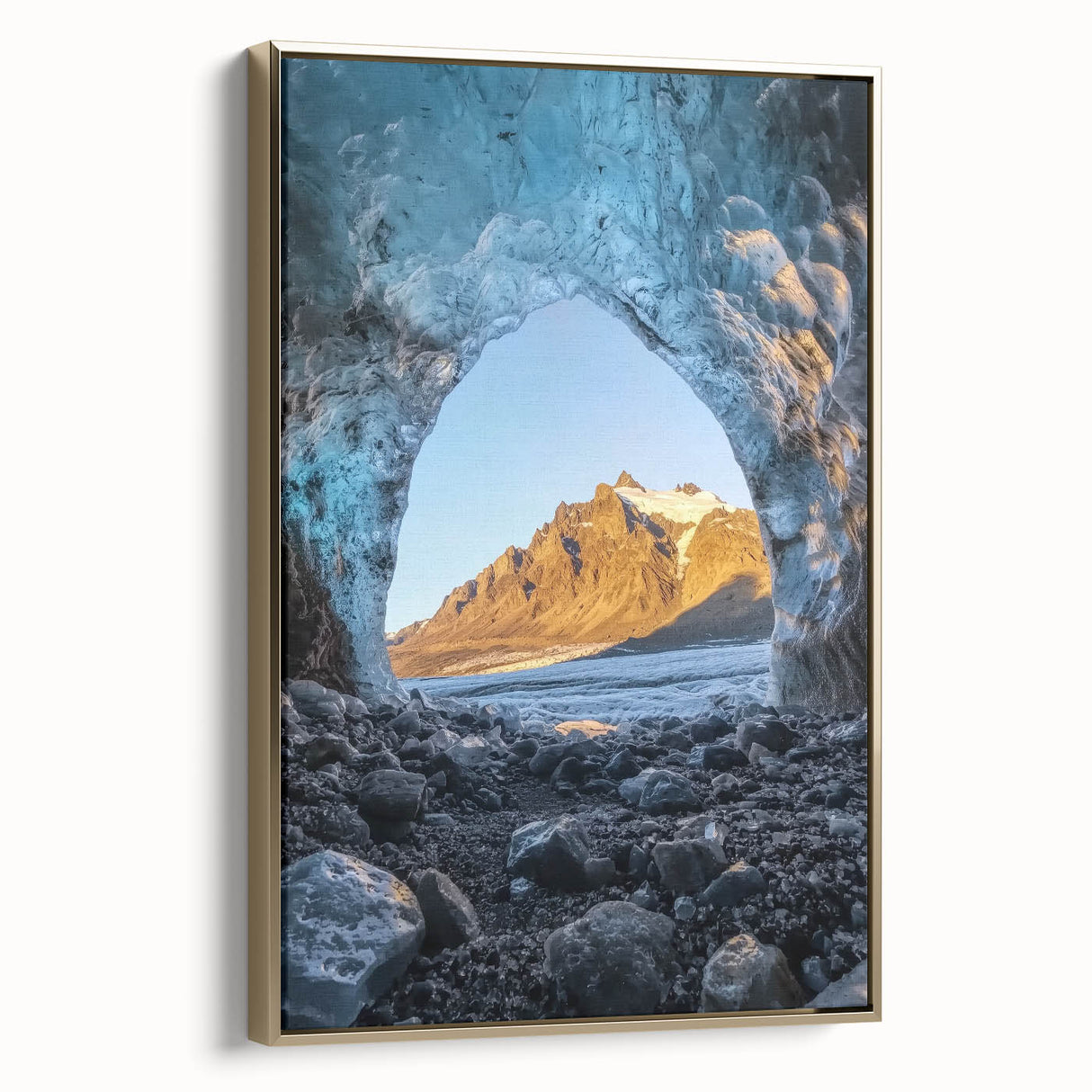 Framed canvas artwork depicting a stunning landscape scene with caves, featuring a gold frame that enhances its elegance, perfect for modern home decor.