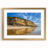 Elegant gold-framed landscape art featuring dramatic cliffs and serene ocean views, designed with a mat for enhanced presentation, perfect for home decor.