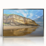 Framed acrylic artwork depicting a dramatic landscape of cliffs and ocean waves, highlighted by silver accents, perfect for modern home decor.