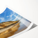 Vibrant landscape print showcasing rugged cliffs at sunset, rolled and ready for framing, highlighting rich colors and intricate details, perfect for home decor.