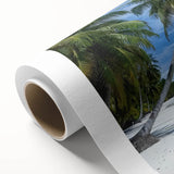 Vibrant rolled canvas artwork depicting a serene beach landscape, showcasing gentle waves and golden sands, ideal for coastal home decor or beach-themed interiors. The piece is packaged securely in a protective cardboard tube, ensuring safe delivery.