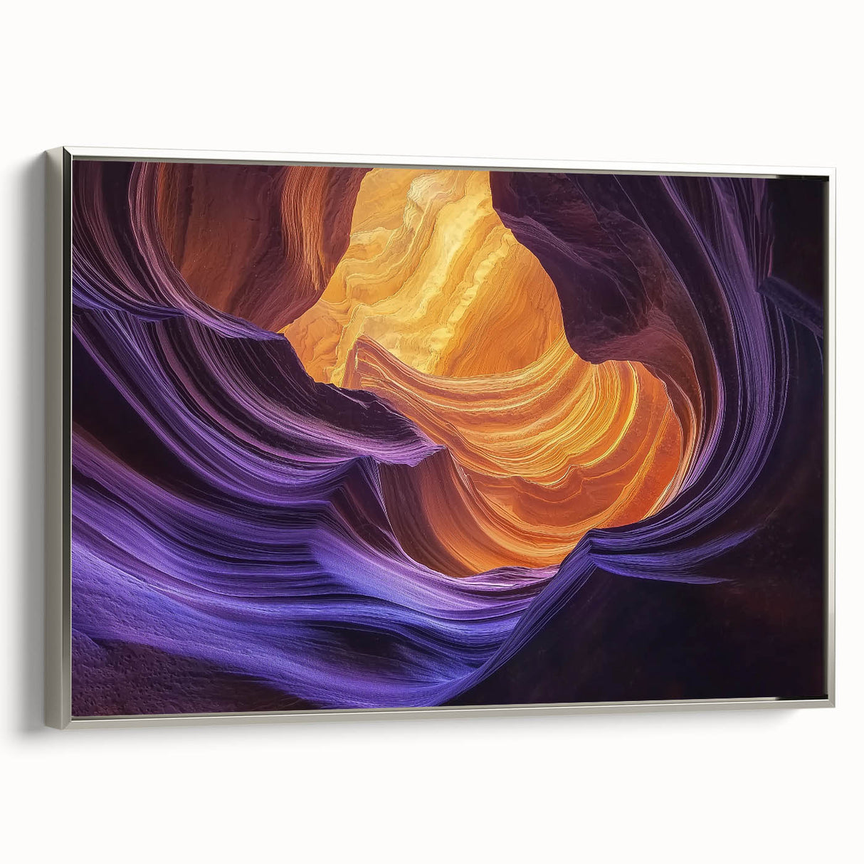 Framed landscape canvas showcasing a stunning canyon view, highlighting rich earthy tones and intricate textures, with a sleek silver frame enhancing its elegance.
