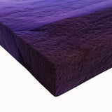 Close-up of a stretched canvas artwork depicting a vibrant landscape of canyons, showcasing rich earthy tones and intricate textures, perfect for home décor.