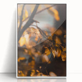 Art deco poster featuring a stylized fall landscape in orange and brown tones, framed in white acrylic.