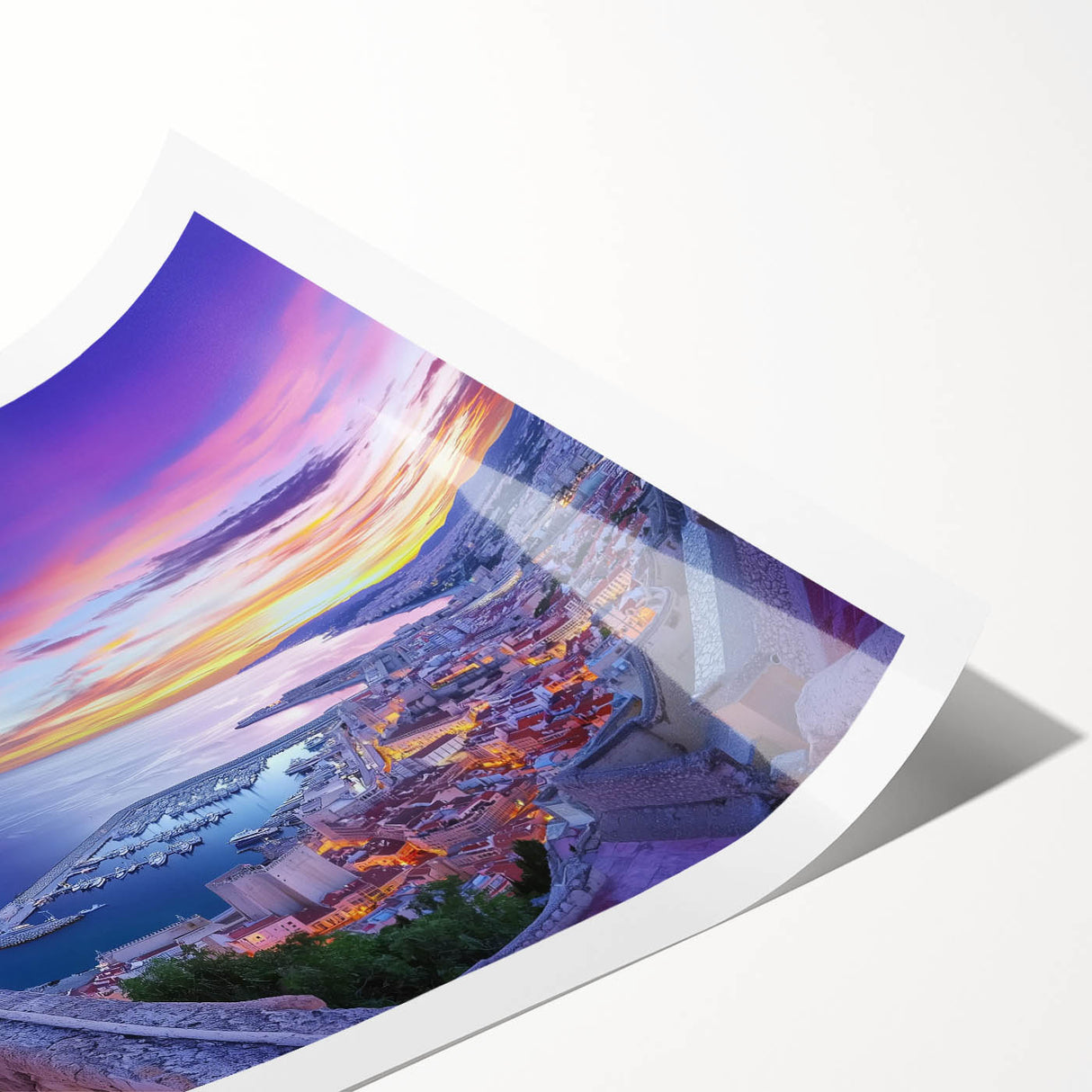 Vibrant rolled print of a majestic castle surrounded by lush landscapes, showcasing intricate details and rich colors, perfect for home decor or artistic displays.