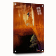 Acrylic landscape artwork of cave formations displayed in a side view, showcasing intricate textures and vibrant colors, secured with pins for stability.