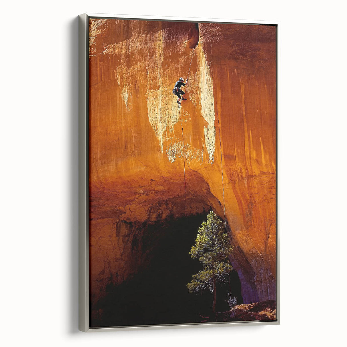 Framed canvas depicting a serene landscape scene with caves, featuring a silver frame that enhances the artwork's elegance, perfect for home decor.