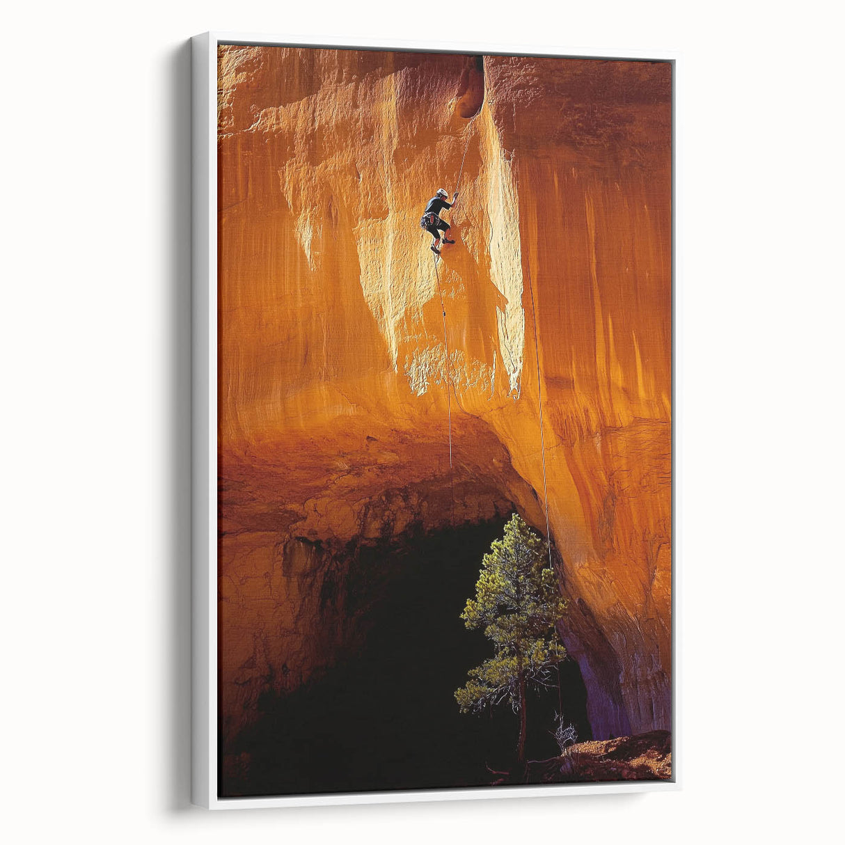 Framed canvas print showcasing a stunning landscape with caves, featuring natural earthy tones and a white frame, perfect for enhancing home decor.