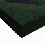 Close-up of a stretched canvas artwork depicting dramatic cliffs and landscapes, showcasing vibrant colors and intricate details, ideal for enhancing home decor.