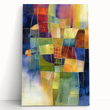 Abstract geometric stretched canvas artwork featuring vibrant blue, orange, and yellow shapes, leaning against a modern interior wall, enhancing contemporary decor.