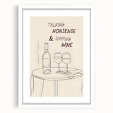 Abstract art print featuring swirling patterns in blue and white, framed in white, suitable for dining room decor.