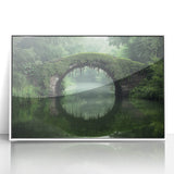 Framed acrylic artwork depicting a serene landscape bridge scene, featuring vibrant colors and intricate details, ideal for enhancing home decor with nature-inspired aesthetics.