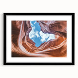 Black-framed landscape art print showcasing vibrant canyons, designed with a white mat for an elegant presentation, perfect for enhancing home decor.