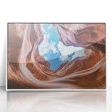 Framed acrylic artwork showcasing a stunning landscape of canyons, featuring vibrant colors and intricate details, perfect for home decor or office spaces.