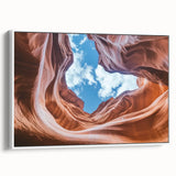 Framed canvas artwork titled "Design 114," showcasing a stunning landscape of canyons in earthy tones, set against a white frame, perfect for home decor enhancement.
