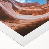 Vibrant landscape canvas print showcasing breathtaking canyons in rich earthy tones, rolled and ready for display, perfect for enhancing home décor aesthetics.