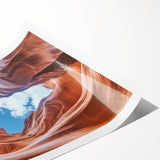 Stunning landscape print showcasing vibrant canyons in warm earth tones, rolled for easy transport. Perfect for adding a natural touch to home decor.