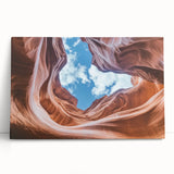 Stretched canvas artwork depicting a scenic landscape of canyons, showcasing vibrant earth tones and dramatic rock formations, ideal for home decor enthusiasts.