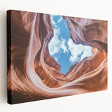 Stretched canvas artwork depicting a stunning landscape of canyons in warm earth tones, showcasing intricate details and textures, perfect for enhancing any interior decor.