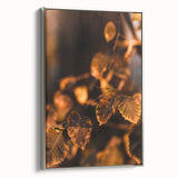 Framed canvas of a vintage-style landscape art painting depicting autumn, with a palette of warm oranges and browns.