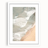 Abstract art print featuring swirling blue and white patterns on a framed canvas.