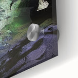 Close-up view of a vibrant acrylic glass artwork depicting a colorful cave landscape, showcasing intricate details and textures, ideal for modern decor.
