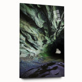 Acrylic landscape artwork depicting a vibrant cave scene in rich colors, displayed in a sleek glass frame with a modern side view, enhancing any interior decor.