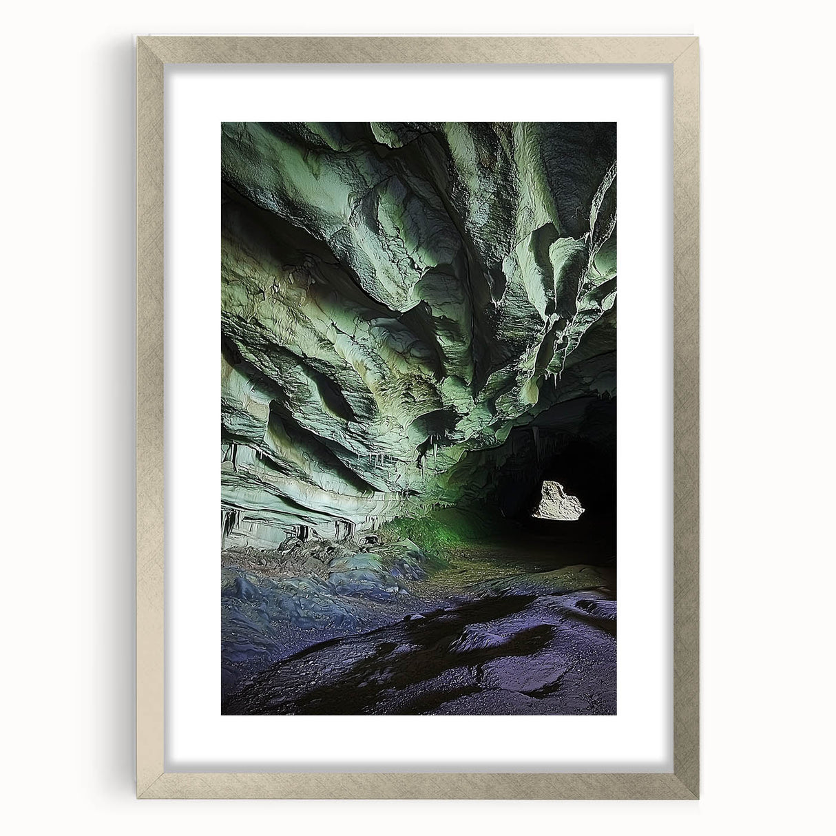 Framed landscape artwork showcasing intricate cave formations, enhanced with a silver mat for a modern touch, ideal for home decor or office aesthetics.