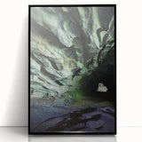 Framed acrylic artwork showcasing a stunning black landscape with cave formations, ideal for modern home decor or art enthusiasts. The sleek black frame enhances the dramatic visual impact of the piece, making it a perfect addition to any contemporary living space.