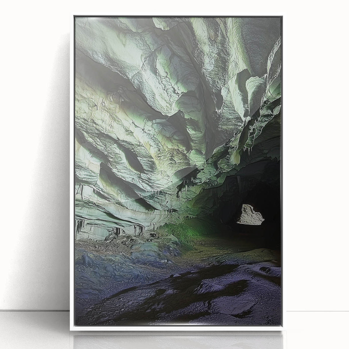 Framed acrylic artwork depicting a serene cave landscape with vibrant colors and intricate details, showcasing natural beauty in a modern white frame, ideal for home decor.