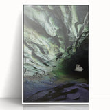 Framed acrylic artwork depicting a serene cave landscape with vibrant colors and intricate details, showcasing natural beauty in a modern white frame, ideal for home decor.
