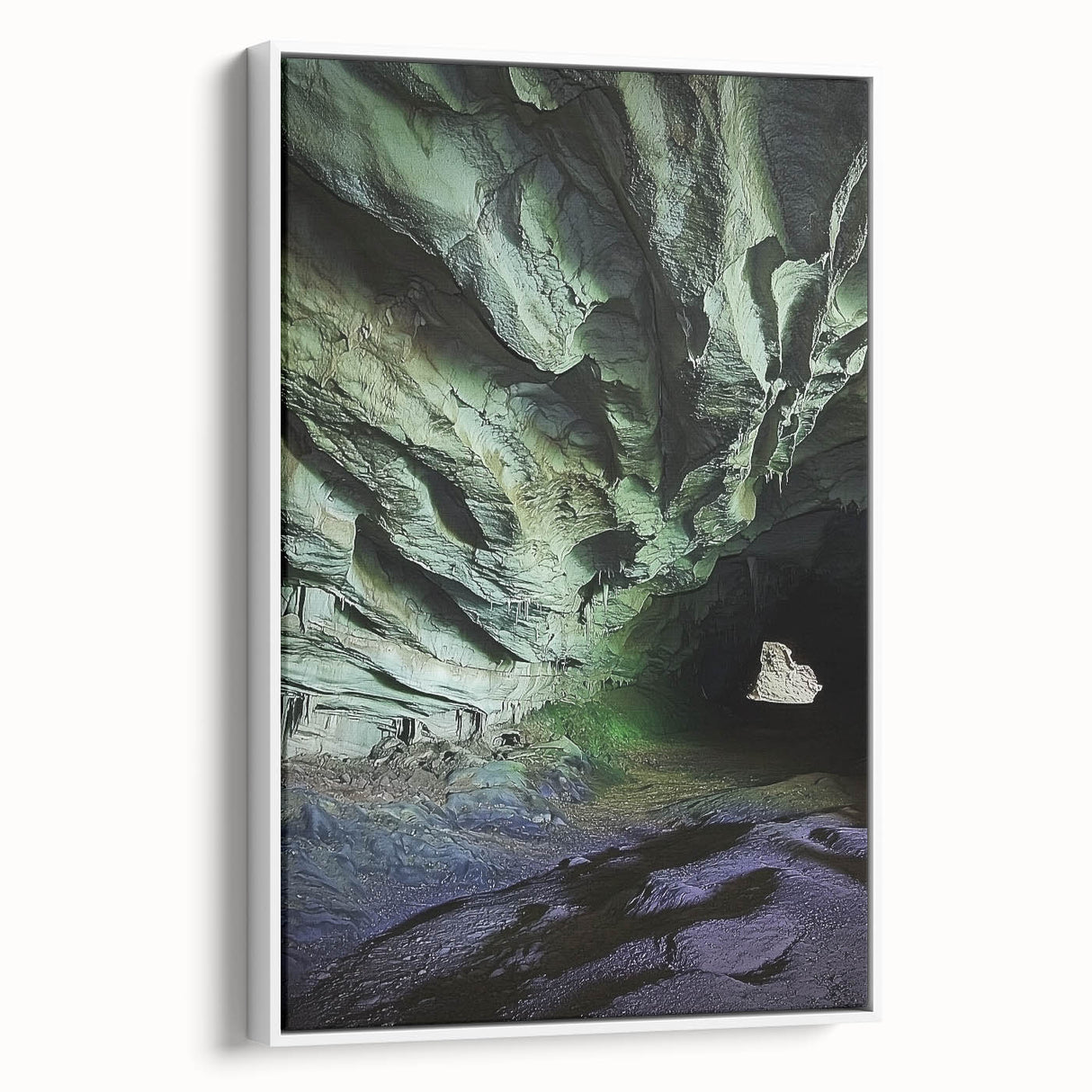 Framed canvas artwork depicting a serene landscape with caves, featuring earthy tones and textures, showcased from a side view against a white background. Ideal for home decor enhancement.