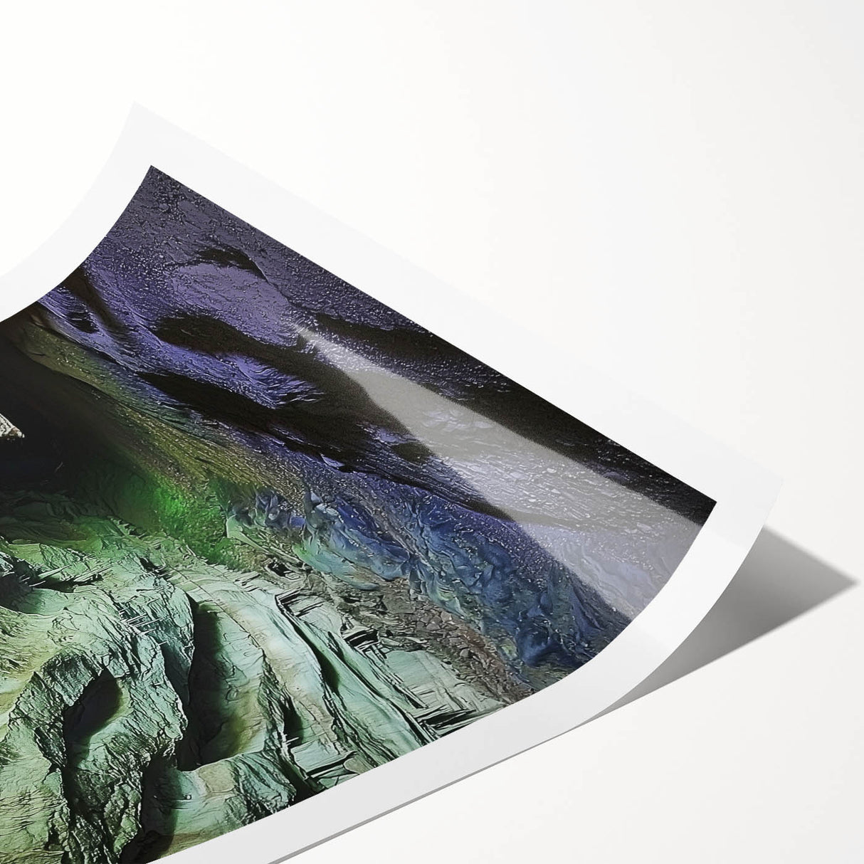 Rolled print showcasing a stunning landscape scene featuring intricate cave formations, beautifully detailed with earthy tones, ideal for home decor or art enthusiasts.