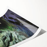 Rolled print showcasing a stunning landscape scene featuring intricate cave formations, beautifully detailed with earthy tones, ideal for home decor or art enthusiasts.