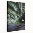 Stretched canvas artwork depicting a serene cave landscape with vibrant colors and intricate details, ideal for adding a natural touch to home decor.