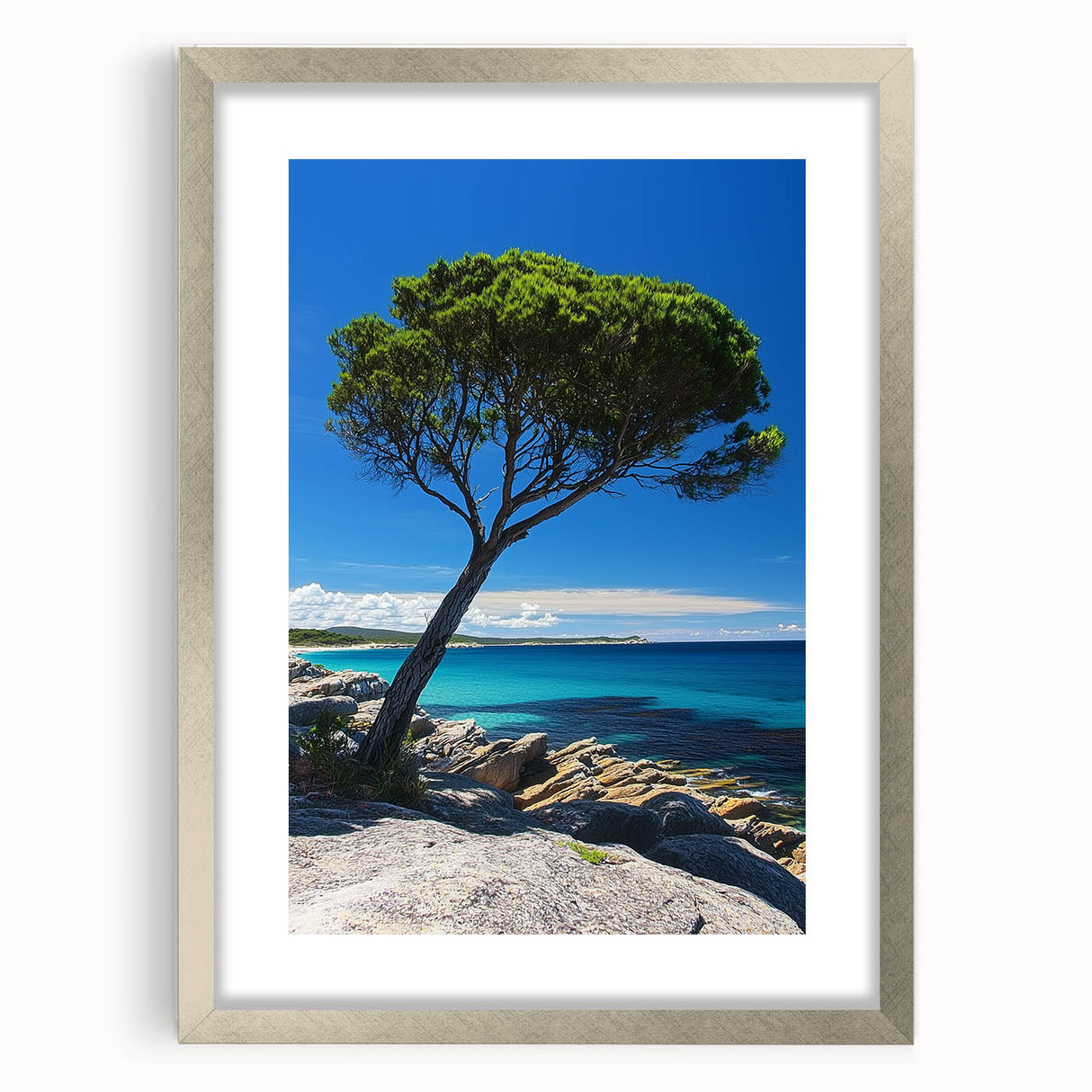 Silver-framed landscape art print showcasing dramatic cliffs and serene skies, elegantly matted for a polished look, ideal for home decor enhancement.
