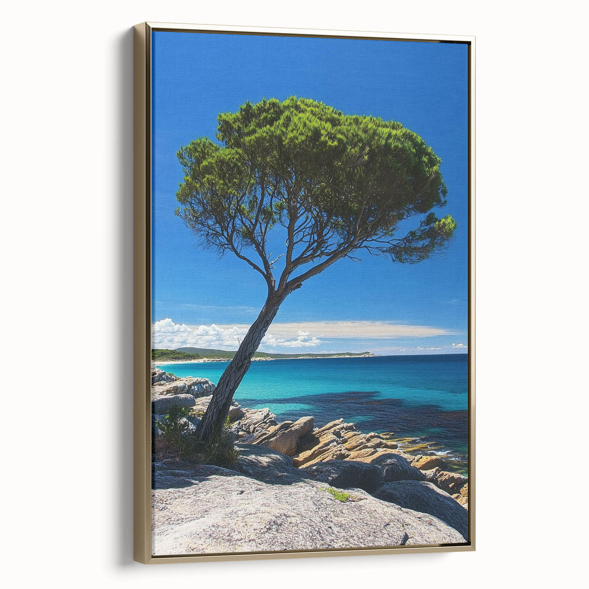 Framed canvas artwork showcasing dramatic cliffs in a coastal landscape, elegantly bordered with gold, perfect for enhancing interior decor.