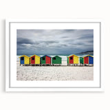 Landscape artwork featuring a serene beach scene framed with a white mat, showcasing vibrant colors and intricate details, perfect for coastal decor enthusiasts.