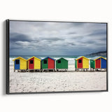 Framed canvas artwork depicting a serene beach landscape with vibrant colors, presented in a sleek black frame, perfect for home decor and beach-themed interiors.