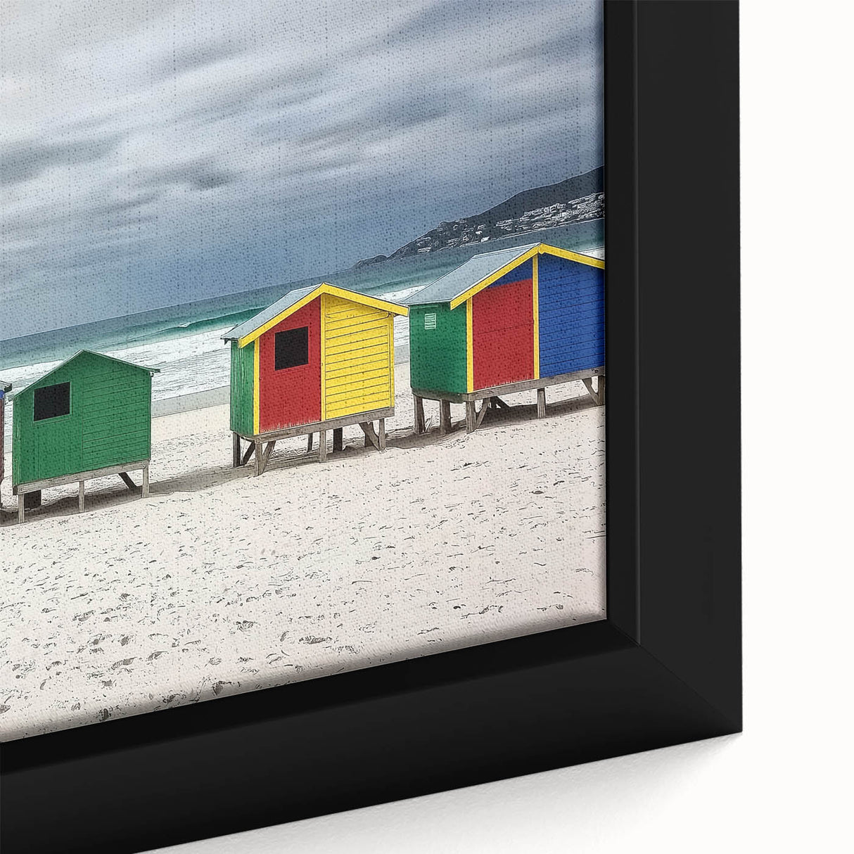 Vibrant close-up of a framed landscape canvas showcasing serene beach scenery with soft waves and golden sands, perfect for coastal home decor.