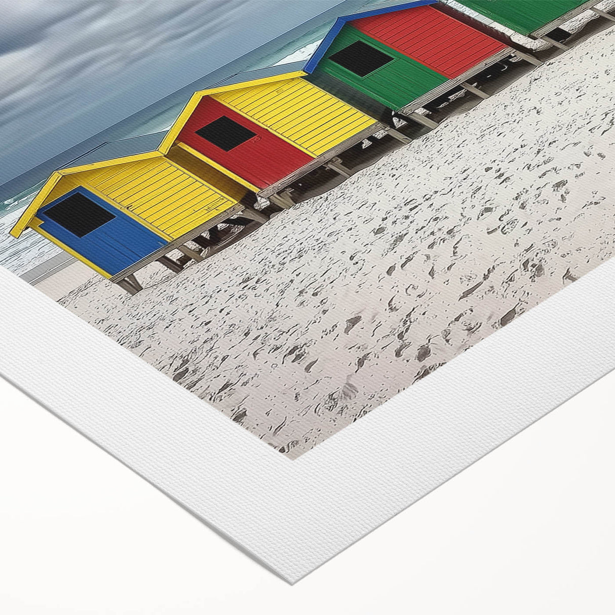 Rolled canvas artwork showcasing a vibrant beach landscape, featuring vivid blue skies and golden sands, elegantly packaged in a protective cardboard tube.