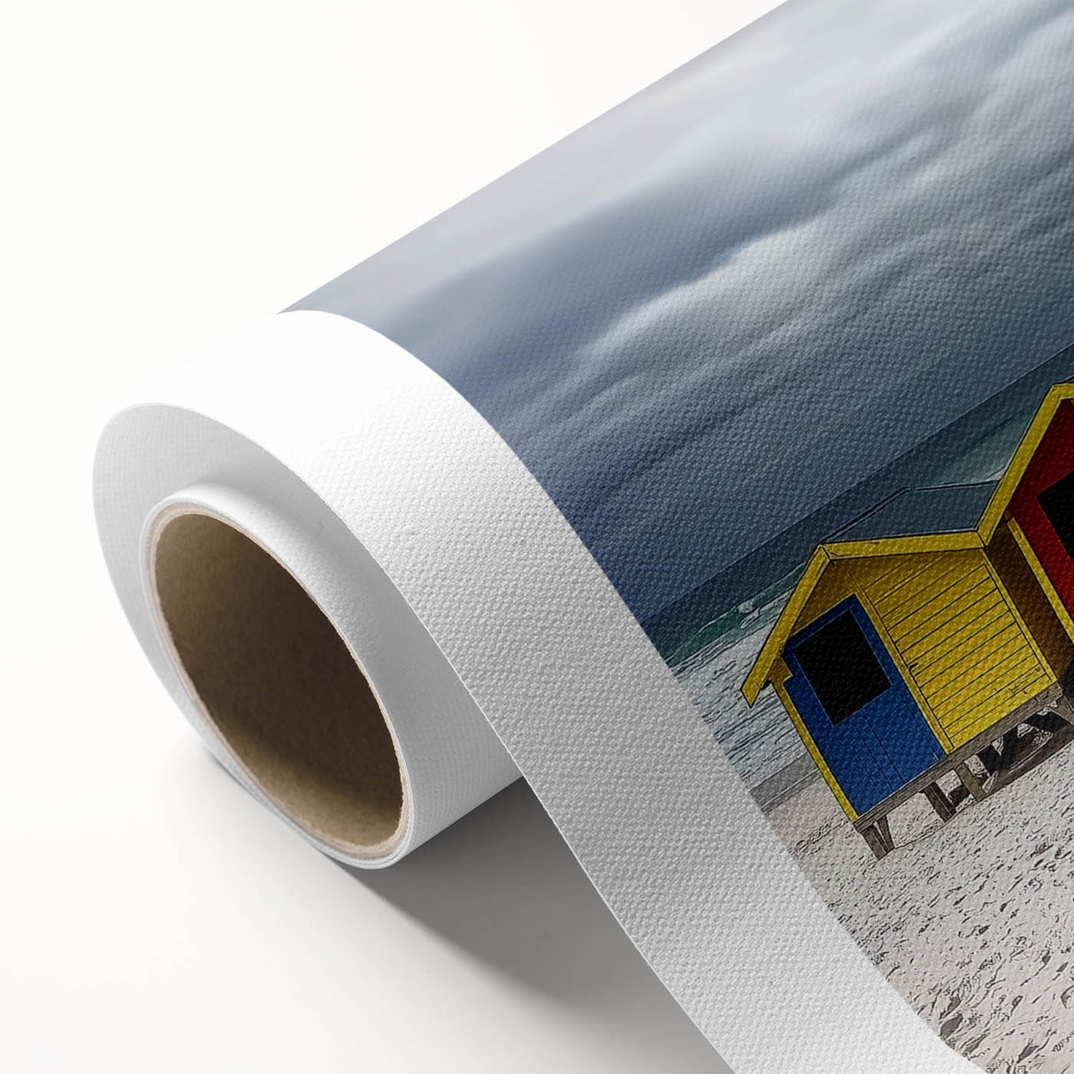 Vibrant rolled canvas showcasing a serene beach landscape with soft waves and golden sands, elegantly packaged in a protective cardboard tube for safe shipping.
