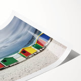 Vibrant landscape canvas print showcasing serene beach scenery with gentle waves and golden sands, beautifully rolled and packaged for safe delivery.