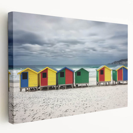 Stretched canvas artwork depicting a vibrant beach landscape with blue skies and golden sand, ideal for coastal-themed decor and enhancing living spaces.