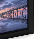 Close-up of a framed canvas artwork depicting a serene landscape bridge scene, showcasing vibrant colors and intricate details, ideal for home decor.